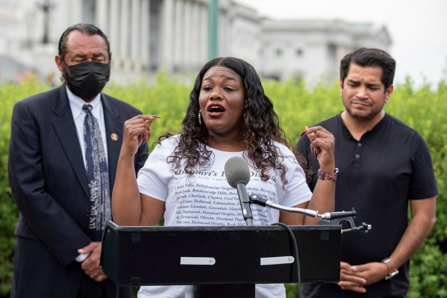 In this Aug. 3, 2021, file photo Rep. Cori Bush, D-Mo., flanked by Rep. Al Green, D-Texas, left, and Rep. Jimmy Gomez, D-Calif., right, speaks to the press after it was announced that the Biden administration will enact a targeted nationwide eviction moratorium outside of Capitol Hill in Washington. Several progressive lawmakers, including Bush, on Tuesday, Sept. 21, introduced a bill that would reimpose a nationwide eviction moratorium at a time when deaths from COVID-19 are running at their highest levels since early March. (AP Photo/Amanda Andrade-Rhoades, File)