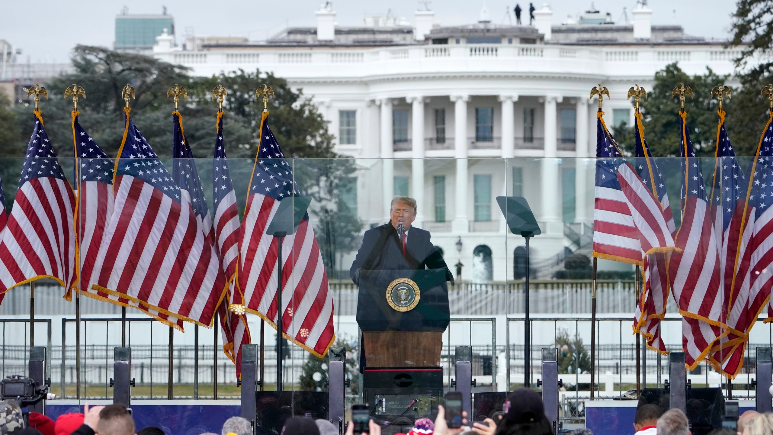 In this Jan. 6, 2021, file photo with the White House in the background, President Donald Trump speaks at a rally in Washington. (AP Photo/Jacquelyn Martin, File)