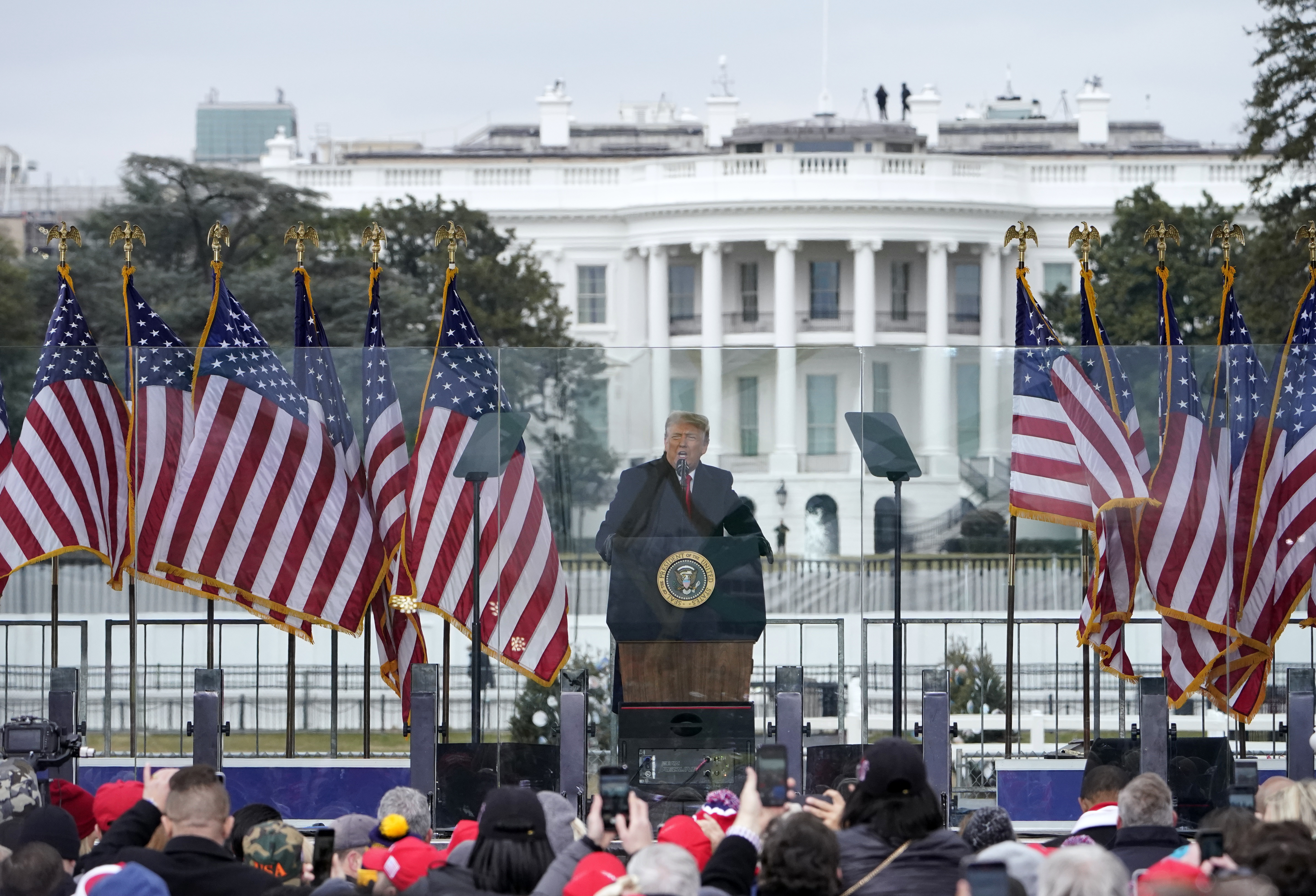 In this Jan. 6, 2021, file photo with the White House in the background, President Donald Trump speaks at a rally in Washington. (AP Photo/Jacquelyn Martin, File)