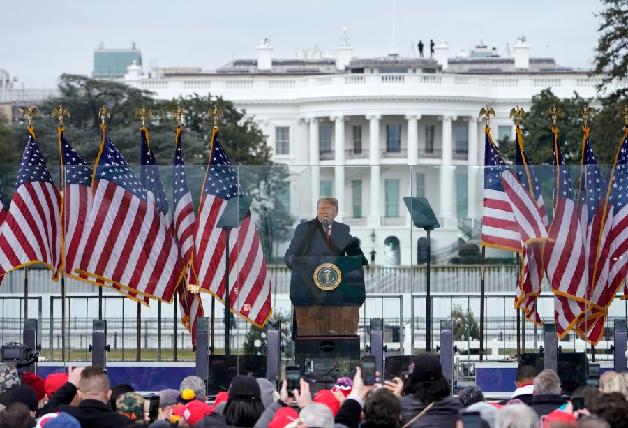 In this Jan. 6, 2021, file photo with the White House in the background, President Donald Trump speaks at a rally in Washington. (AP Photo/Jacquelyn Martin, File)