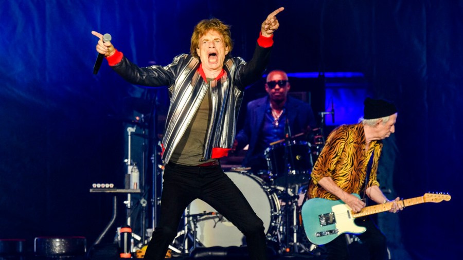 Mick Jagger, from left, Steve Jordan and Keith Richards of the Rolling Stones perform during the "No Filter" tour at The Dome at America's Center, Sunday, Sept. 26, 2021, in St. Louis. (Photo by Amy Harris/Invision/AP)