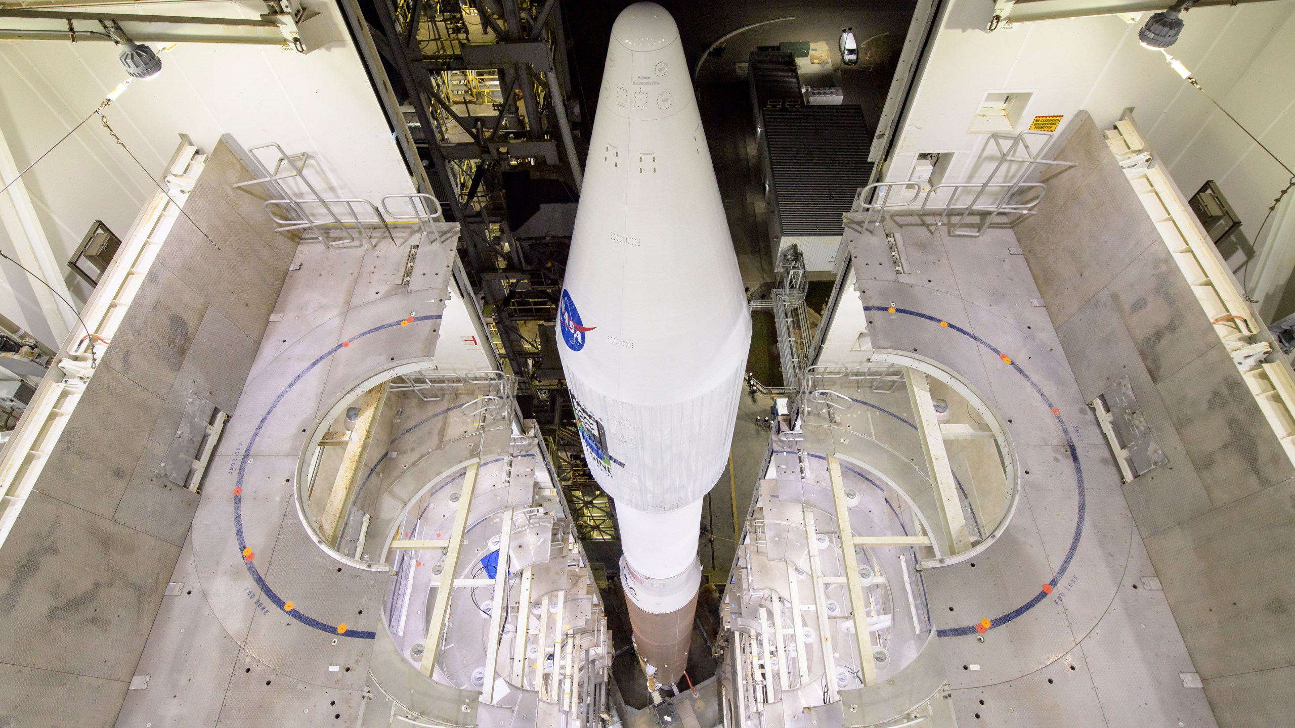 This photo provided by NASA shows the United Launch Alliance Atlas V rocket with the Landsat 9 satellite onboard at Vandenberg Space Force Base, Calif., on Monday, Sept. 27, 2021. A project of NASA and the U.S. Geological Survey, Landsat 9 will work in tandem with a predecessor, Landsat 8, to extend a nearly 50-year data record of land and coastal regions that began with the launch of the first Landsat in 1972. (Bill Ingalls/NASA via AP)