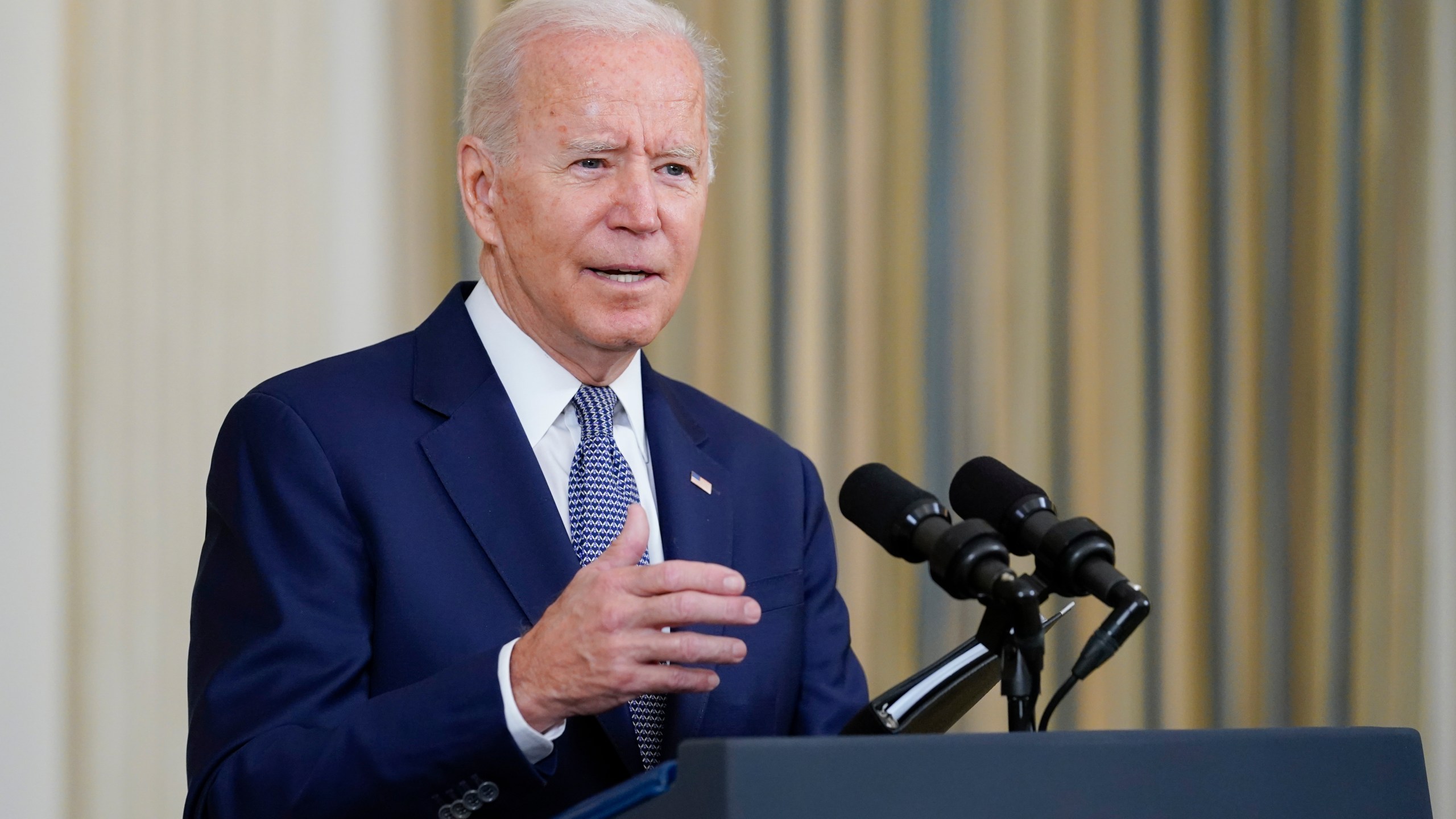 President Joe Biden speaks from the State Dining Room of the White House in Washington, Friday, Sept. 3, 2021, on the August jobs report. (AP Photo/Susan Walsh)