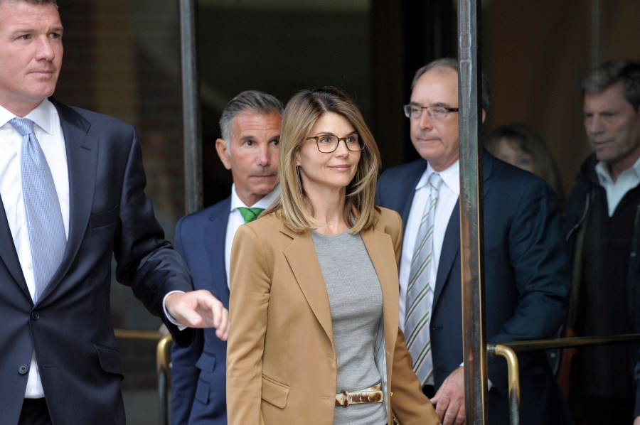 Actress Lori Loughlin exits the courthouse after facing charges for allegedly conspiring to commit mail fraud and other charges in the college admissions scandal at the John Joseph Moakley United States Courthouse in Boston on April 3, 2019. (Joseph Prezioso/AFP via Getty Images)