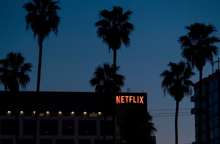 The Netflix logo sign is seen on top of its office building on Feb. 4, 2021 in Hollywood, California. (VALERIE MACON/AFP via Getty Images)