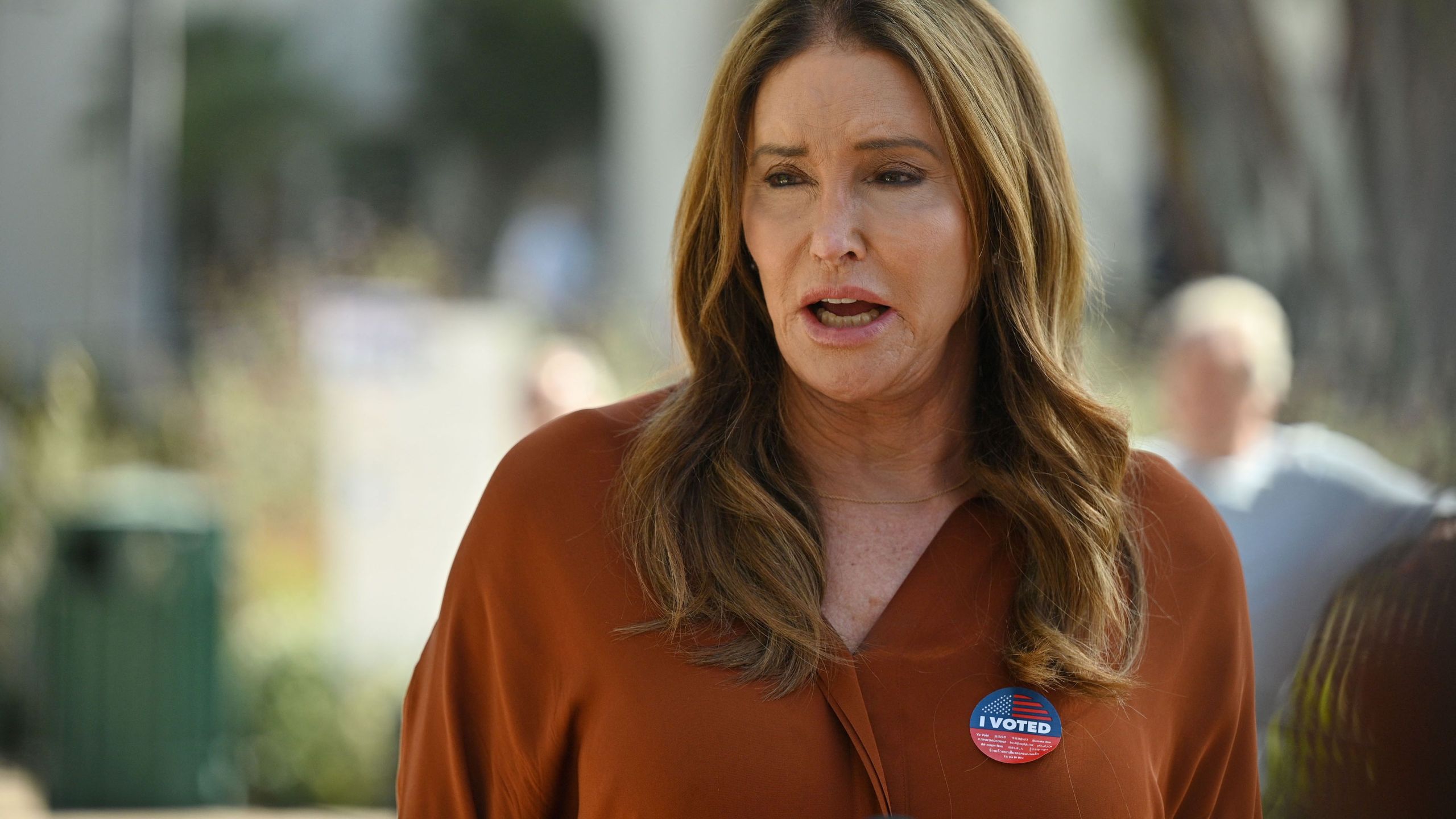 Candidate Caitlyn Jenner speaks to the media after casting her ballot in the California gubernatorial recall election at a polling station in Beverly Hills on Sept. 14, 2021. (Robyn Beck / AFP / Getty Images)