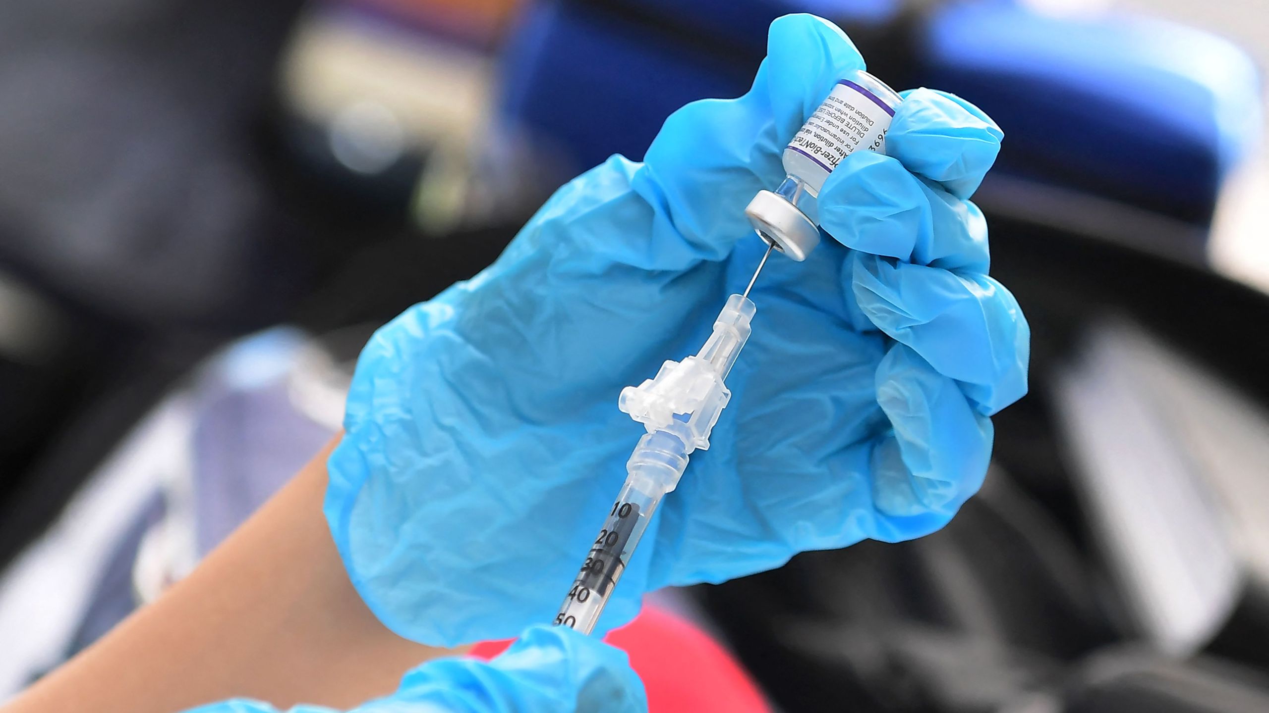 The Pfizer COVID-19 vaccine is prepared for administration at a vaccination clinic for homeless people, hosted by the Los Angeles County Department of Public Health and United Way on Sept. 22, 2021 in Los Angeles. ( FREDERIC J. BROWN/AFP via Getty Images)