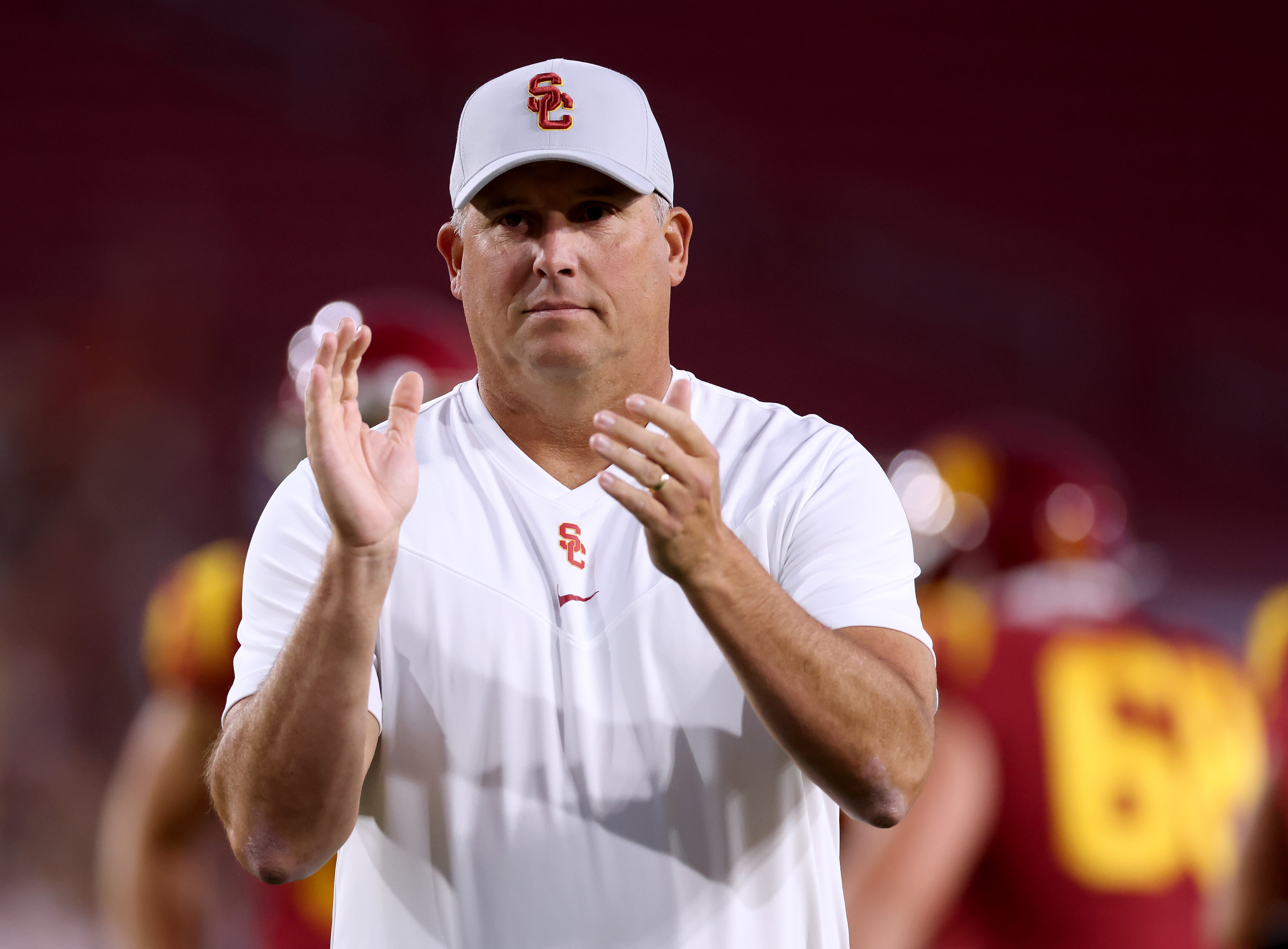 Head coach of the USC Trojans Clay Helton cheers on his team during warm up before the game against the Stanford Cardinal at Los Angeles Memorial Coliseum on Sept. 11, 2021 in Los Angeles. (Harry How/Getty Images)