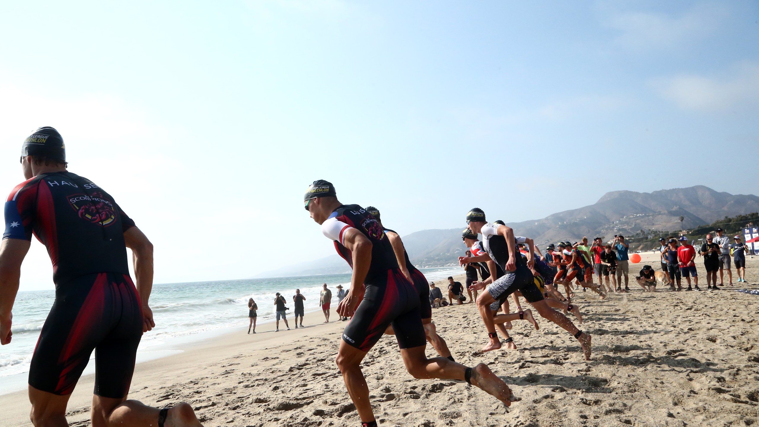 Athletes compete the men's pro Super League Malibu Triathlon, on September 25, 2021 in Zuma Beach, California. (Tommaso Boddi/Getty Images for 2XU Malibu Triathlon)