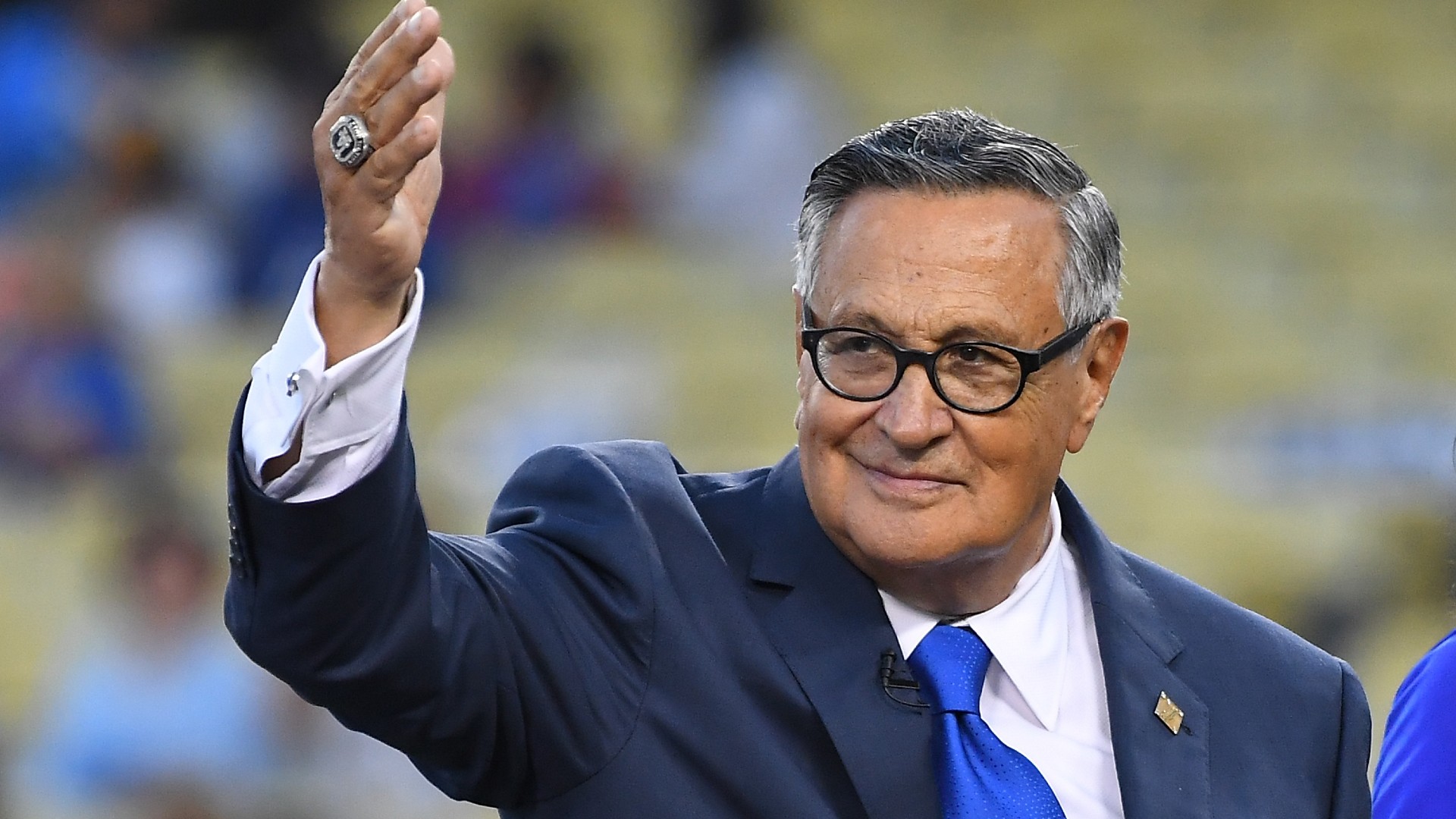 Longtime Los Angeles Dodgers broadcaster Jaime Jarrin acknowledges the crowd after being inducted into the Dodger Stadium Ring of Honor the game against the San Diego Paders at Dodger Stadium on September 2, 2018. (Jayne Kamin-Oncea/Getty Images)