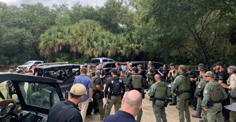 This photo provided by North Port Police Department, law enforcement officials conduct a search of the vast Carlton Reserve in the Sarasota, Fla., area for Brian Laundrie on Saturday, Sept. 18, 2021. Laundrie is a person of interest in the disappearance of his girlfriend, Gabrielle “Gabby” Petito. (North Port Police Department via AP)