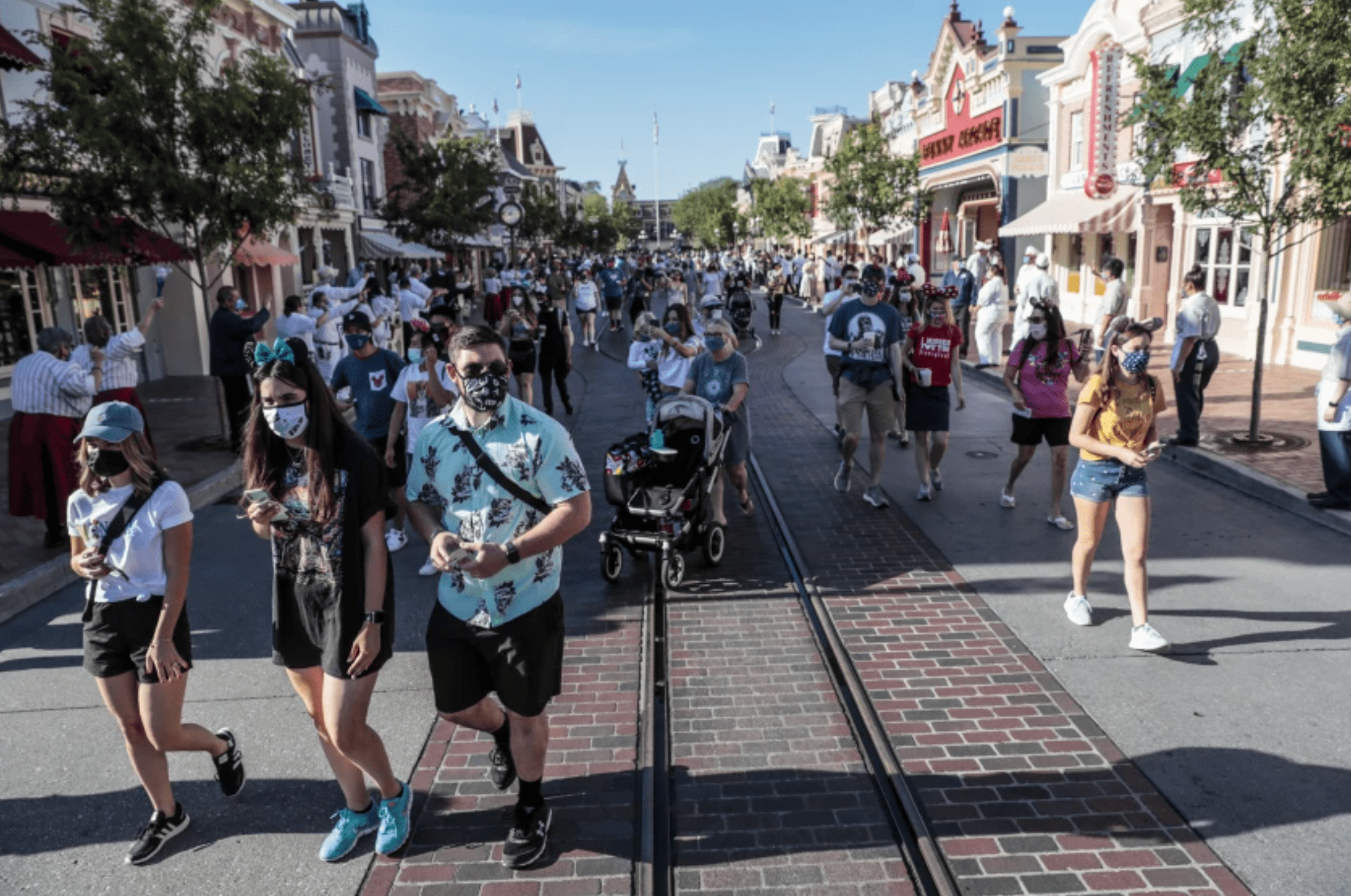 Disney fans stream into the park on the first day Disneyland opened after closing for more than a year. Wait times for many of the rides have dropped. (Robert Gauthier / Los Angeles Times)