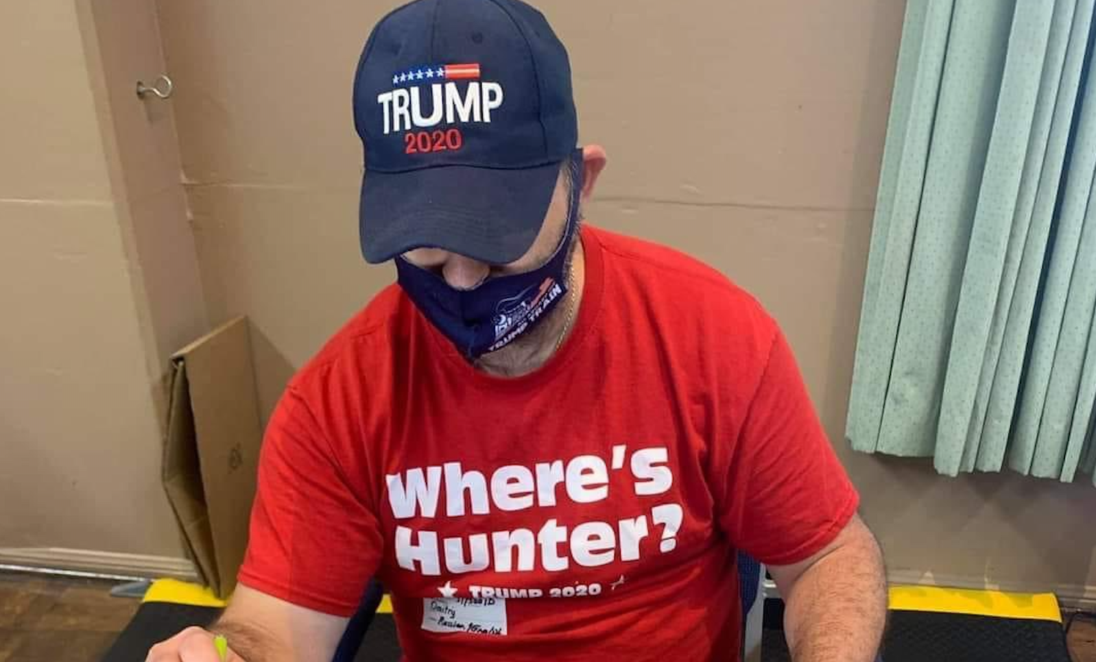 A poll worker at a West Hollywood vote center was dismissed for wearing Trump regalia during the Sept. 14, 2021, recall election, as captured in this photo (Frank Santoyo)