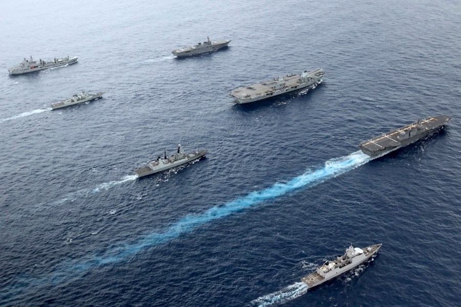 Front to back; HNLMS Evertsen, JS Izumo, HMS Defender, HMS Queen Elizabeth, HMCS Winnipeg, JS Ise, RFA Tidespring. UK Royal Navy Carrier Strike Group 21 HMS Queen Elizabeth, HMS Defender, RFA Tidespring and HNLMS Evertsen from CSG21 sails with Japanese ships JS Izumo and JS Ise along with the Canadian ship HMCS Winnipeg in the Pacific Ocean, Sept. 2021. With increasingly strong talk in support of Taiwan, a new deal to supply Australia with nuclear submarines, and the launch of a European strategy for greater engagement in the Indo-Pacific, the U.S. and its allies are becoming growingly assertive in their approach toward a rising China. (UK Ministry of Defence via AP)