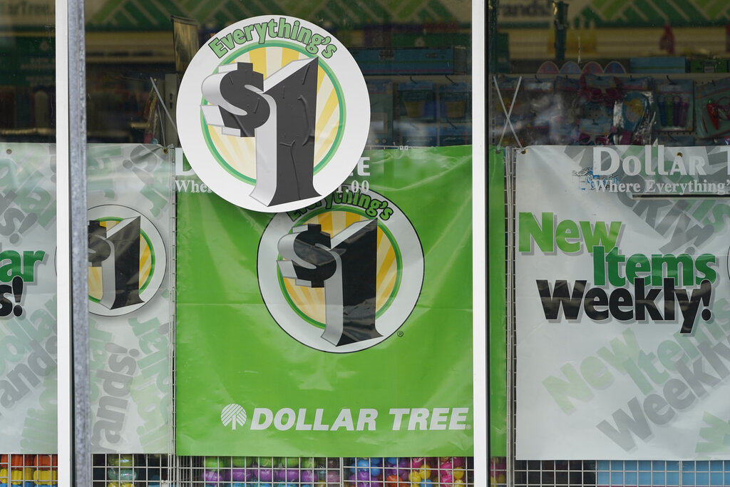 Dollar Tree store logos indicating that everything in the store is for $1 are promoted on its storefront window in Jackson, Miss. Dollar Tree, the national chain of stores that promises everything from a buck, will begin introducing items on its shelves that will exceed $1. The company said, Wednesday, Sept. 29, that it's responding to customer requests and said pushing the $1 barrier will allow for a better mix of products. (AP Photo/Rogelio V. Solis)