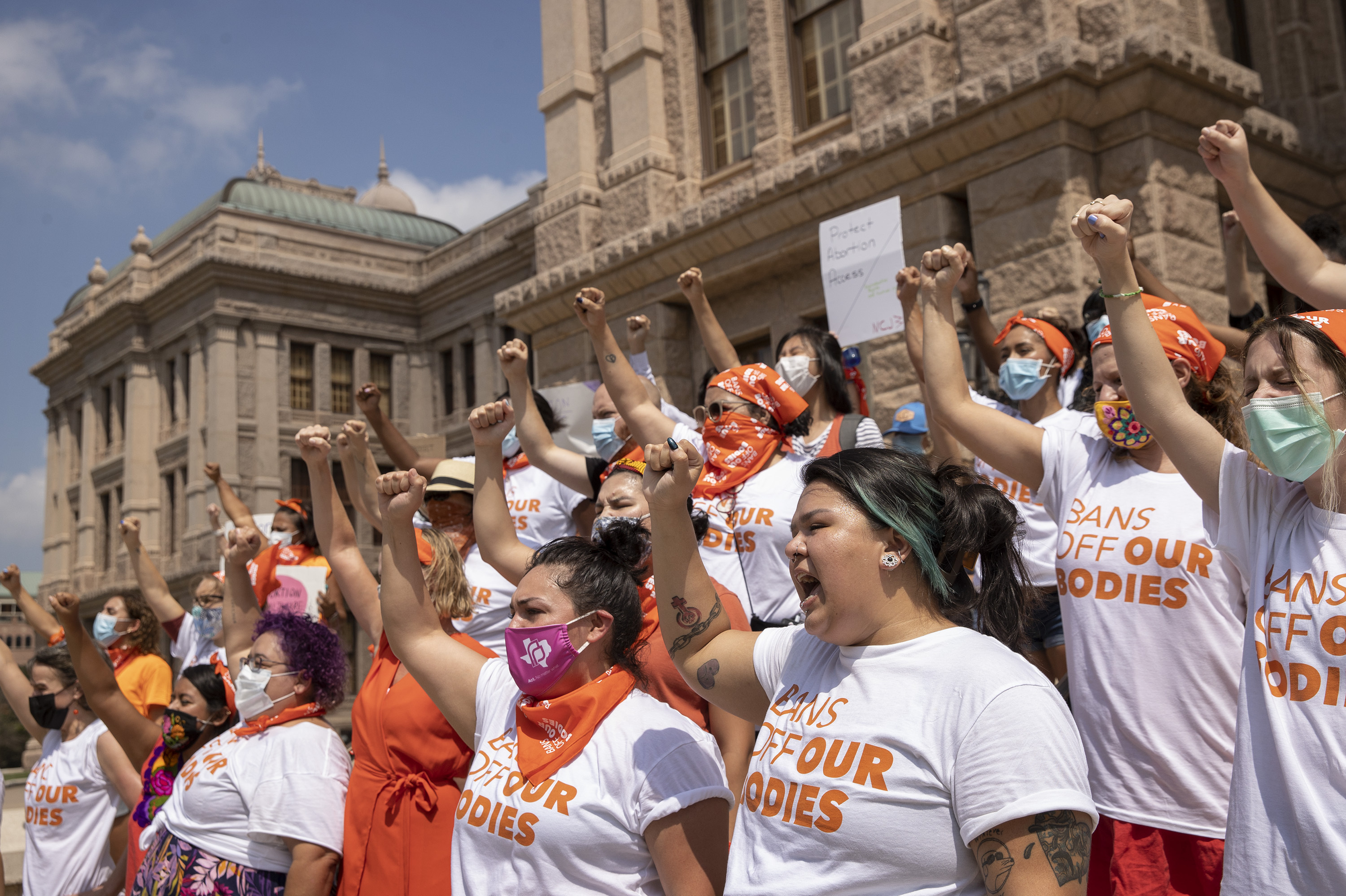 In this Wednesday, Sept. 1, 2021, file photo, women protest against Texas' restrictive abortion law at the Capitol in Austin, Texas. (Jay Janner/Austin American-Statesman via AP)