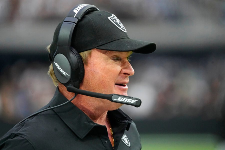 Las Vegas Raiders head coach Jon Gruden stands on the sidelines during the first half of an NFL football game against the Miami Dolphins, Sunday, Sept. 26, 2021, in Las Vegas. (AP Photo/Rick Scuteri)