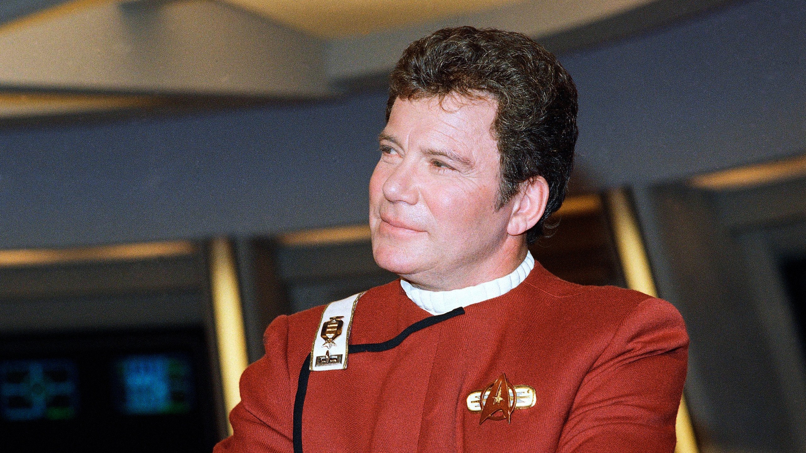 In this 1988 file photo, William Shatner, who portrays Capt. James T. Kirk, attends a photo opportunity for the film "Star Trek V: The Final Frontier." Star Trek’s Captain Kirk is rocketing into space this month — boldly going where no other sci-fi actors have gone. Jeff Bezos’ space travel company, Blue Origin, announced Monday, Oct. 4, 2021 that Shatner will blast off from West Texas on Oct. 12. (AP Photo/Bob Galbraith)