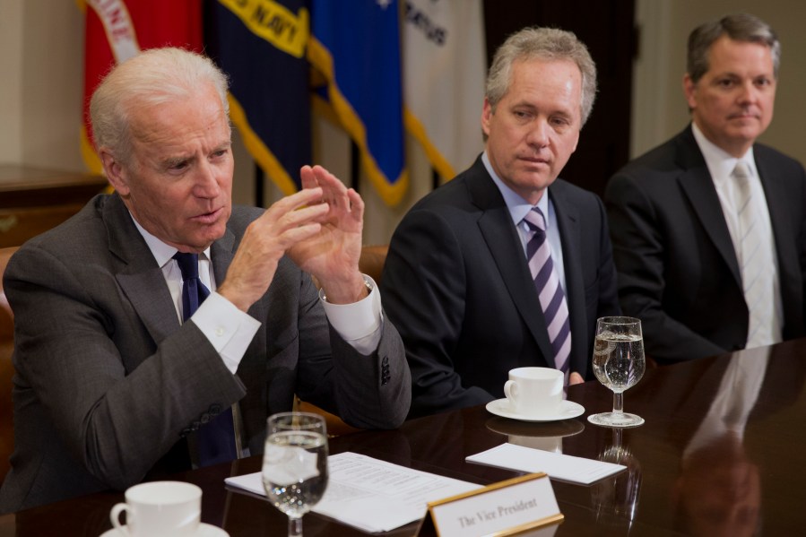 In this Thursday, Jan. 23, 2014, file photo, Vice President Joe Biden, left, speaks during a meeting with U.S. mayors including Louisville, Ky. Mayor Greg Fischer, center, to discuss workforce development, in the Roosevelt Room of the White House in Washington. (AP Photo/Jacquelyn Martin, File)