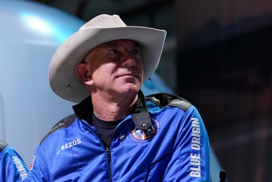 In this July 20, 2021 file photo, Jeff Bezos, founder of Amazon and space tourism company Blue Origin, participates in post launch briefing from its spaceport near Van Horn, Texas. (AP Photo/Tony Gutierrez)