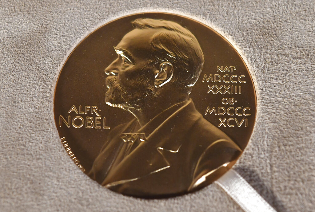 A Tuesday, Dec. 8, 2020 file photo of a Nobel medal displayed during a ceremony in New York. (Angela Weiss/Pool Photo via AP, File)