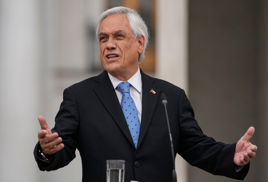 Chilean President Sebastian Piñera gives a press conference at La Moneda presidential palace in Santiago, Chile, Monday, Oct. 4, 2021. Piñera is one of hundreds of current and former politicians identified as beneficiaries of secret offshore bank accounts to hide their investments and shield assets, according to the International Consortium of Investigative Journalists in a global report released on Oct. 3, 2021, dubbed the "Pandora Papers." (AP Photo/Esteban Felix)