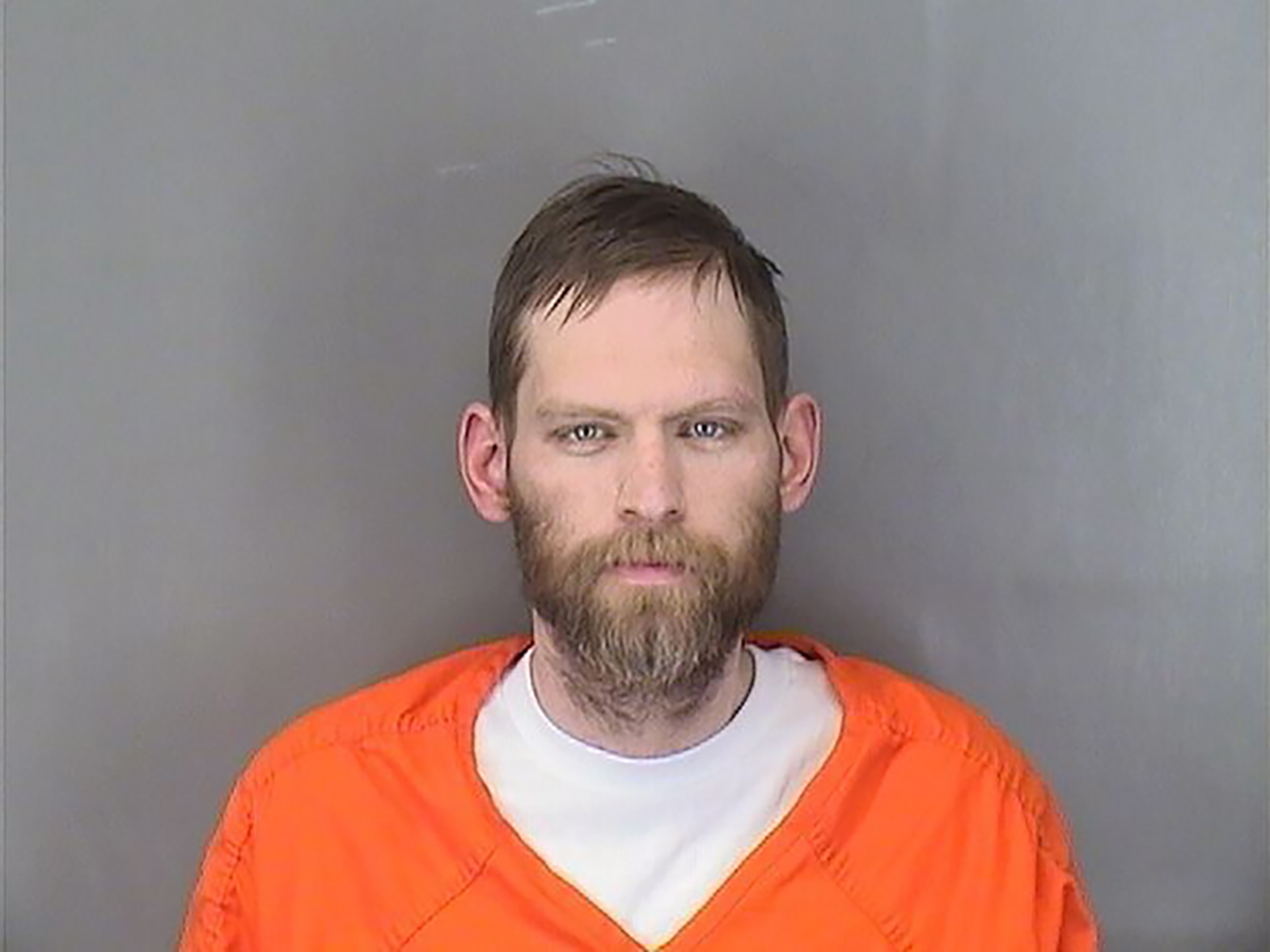 This booking photo provided by the Sarpy County Sheriff's Department shows Adam Price after his arrest in May 2021. (Sarpy County Sheriff's Department via AP)