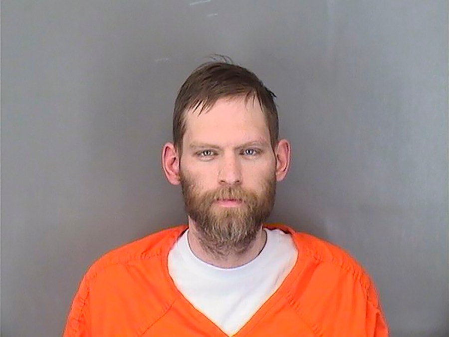 This booking photo provided by the Sarpy County Sheriff's Department shows Adam Price after his arrest in May 2021. (Sarpy County Sheriff's Department via AP)