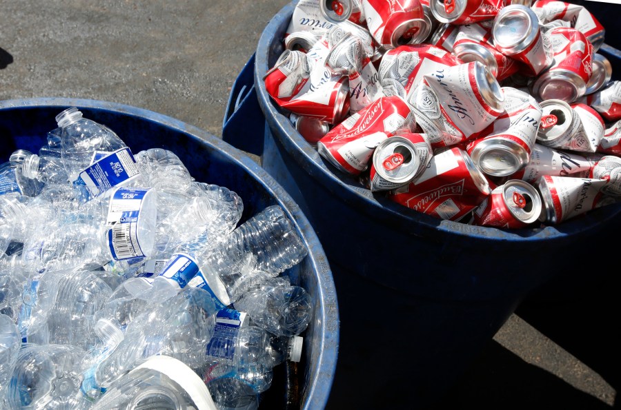 Cans and plastic bottles brought in for recycling are seen at a recycling center in Sacramento on July 5, 2016. (Rich Pedroncelli / Associated Press)