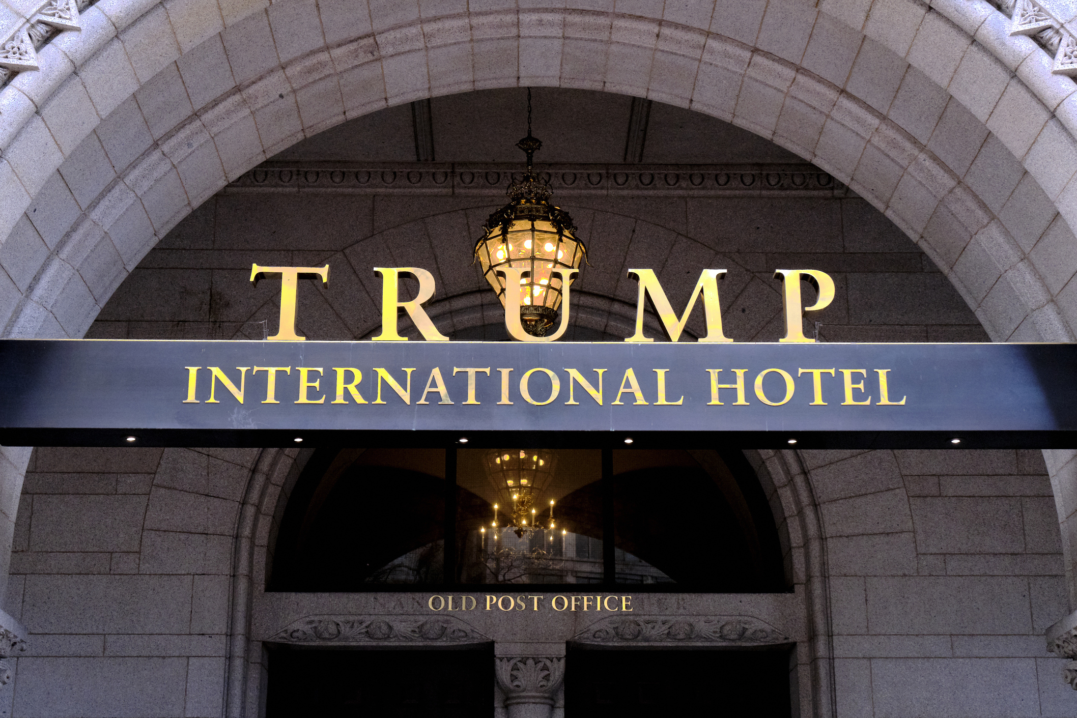 This March 11, 2019 file photo, shows the north entrance of the Trump International in Washington. Former President Donald Trump's company lost more than $70 million operating his Washington D.C. hotel while in office, forcing him at one point get a reprieve from a major bank on payments on a loan, according to documents released Friday, Oct. 8, 2021, by a House committee investigating his business. (AP Photo/Mark Tenally, File)