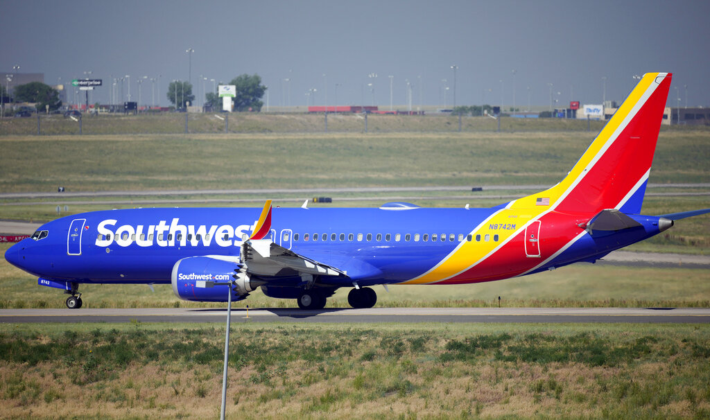 In this July 2, 2021, file photo, a Southwest Airlines jetliner taxis down a runway for take off from Denver International Airport in Denver. (AP Photo/David Zalubowski, File)