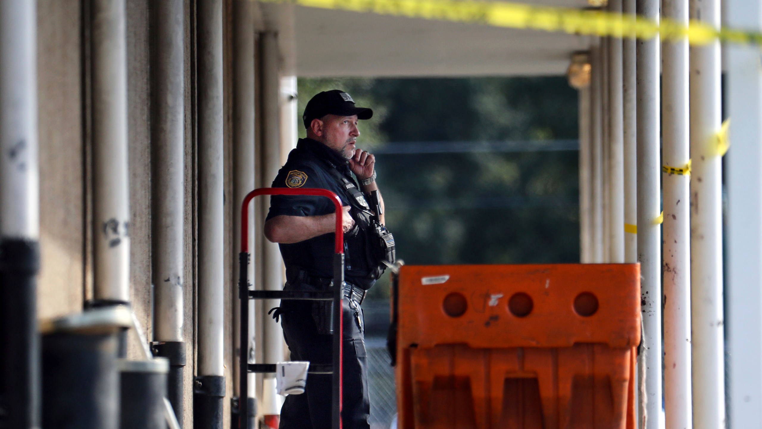 Memphis Police Department officers work the scene of a post office after a shooting, Tuesday, Oct. 12, 2021 in the Orange Mound neighborhood of Memphis, Tenn. Police investigated a shooting Tuesday at a post office in an historic neighborhood of Memphis, Tennessee, the third high-profile shooting in the region in weeks.(Patrick Lantrip/Daily Memphian via AP)