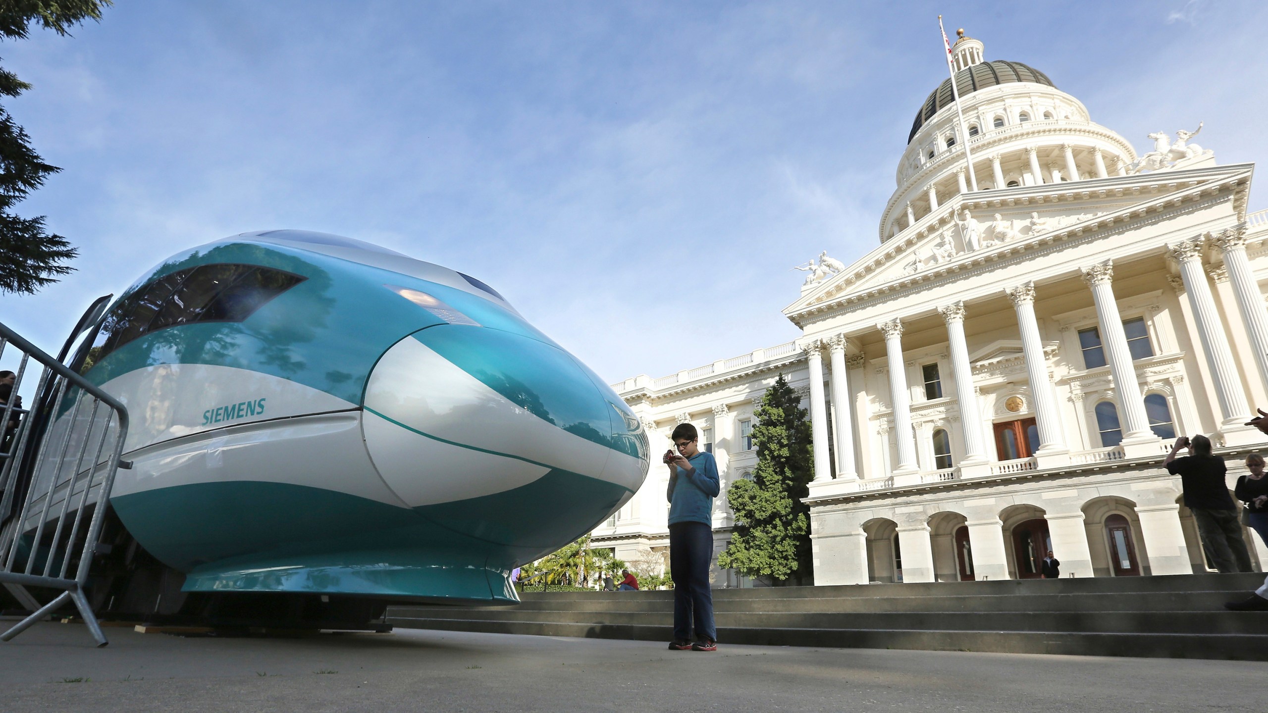 In this Feb. 26, 2015, file photo, a full-scale mock-up of a high-speed train is displayed at the Capitol in Sacramento, Calif. (AP Photo/Rich Pedroncelli, File)