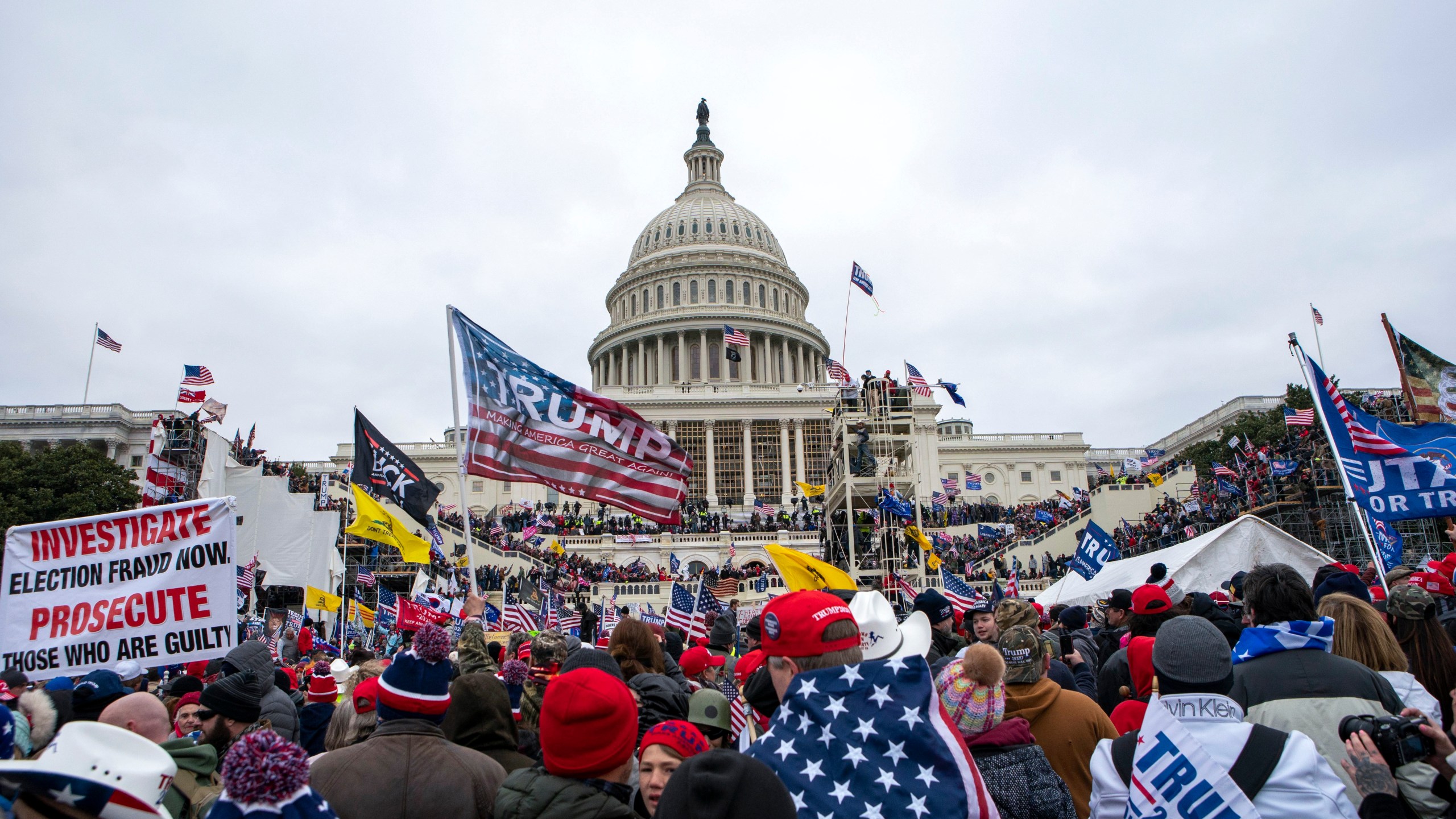 In this Jan. 6, 2021, file photo insurrections loyal to President Donald Trump rally at the U.S. Capitol in Washington. A federal judge held the director of the District of Columbia’s Department of Corrections and the warden of the city’s jail in contempt of court on Wednesday, Oct. 13, and asked the Justice Department to investigate whether the civil rights of inmates are being abused. U.S. District Judge Royce Lamberth had hauled the jail officials into court as part of the criminal case into Christopher Worrell, a member of the Proud Boys who has been charged in the Jan. 6 attack at the U.S. Capitol. (AP Photo/Jose Luis Magana, File)