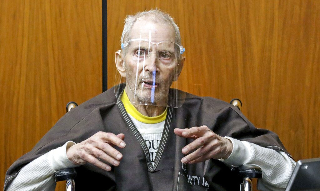 In this Monday, Aug. 9, 2021, file photo, New York real estate scion Robert Durst, 78, answers questions from defense attorney Dick DeGuerin, while testifying in his murder trial at the Inglewood Courthouse in Inglewood, Calif. (Gary Coronado/Los Angeles Times via AP, Pool, File)