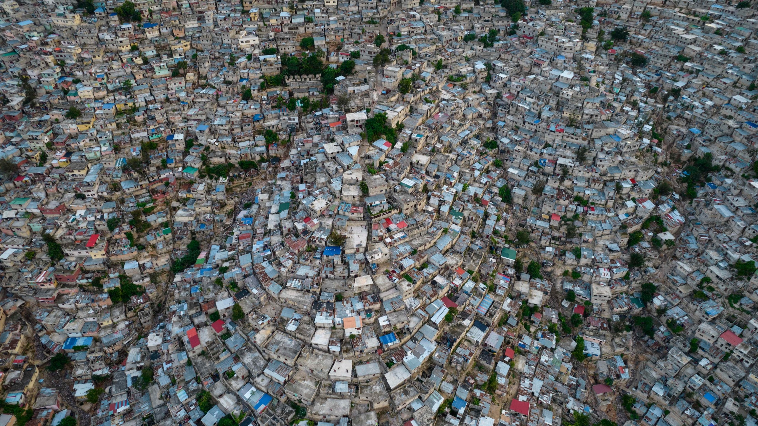 A view of the densely populated Jalousie neighborhood of Port-au-Prince, Tuesday, Sept. 28, 2021. (AP Photo/Rodrigo Abd, file)