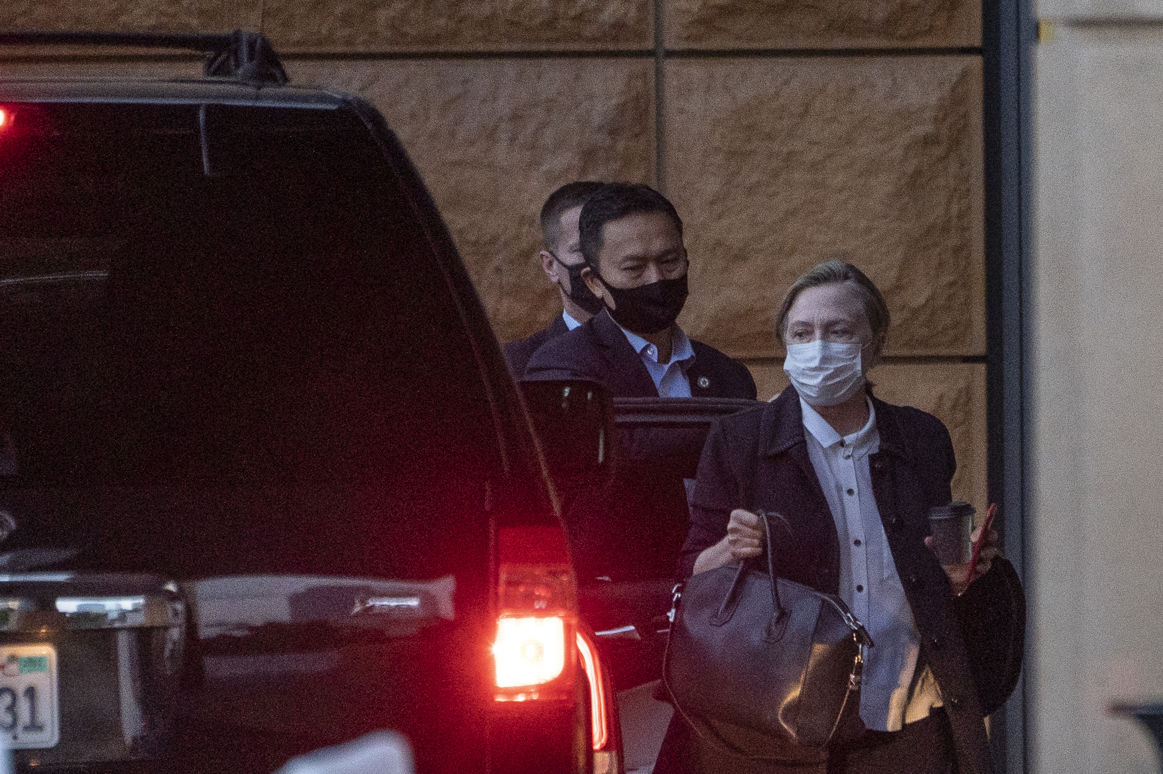 Former first lady and former U.S. Secretary of State Hillary Clinton arrives at the University of California Irvine Medical Center in Orange, Calif., Sunday, Oct. 17, 2021. Former President Clinton spent a fourth night at the Southern California hospital where he is recovering from an infection but is expected to be released Sunday after making great progress, a spokesman said. (AP Photo/Damian Dovarganes)