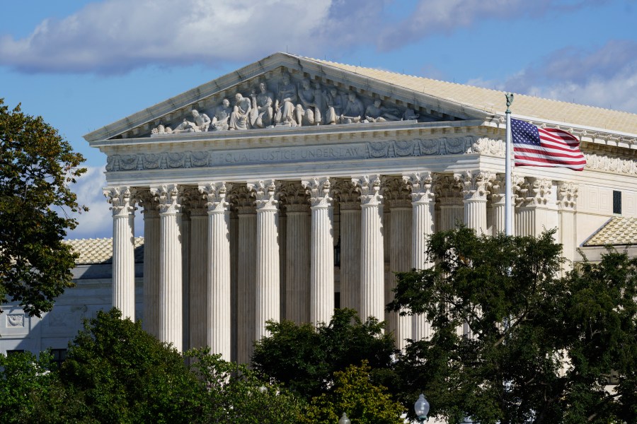 In this Oct. 18, 2021 photo, the Supreme Court is seen in Washington. Texas is urging the Supreme Court to leave in place its law banning most abortions and telling the justices there’s no reason to rush into the case. The state filed its response Thursday to the Biden administration’s call on the high court to block the law and rule conclusively this term on the measure’s constitutionality. (AP Photo/J. Scott Applewhite)