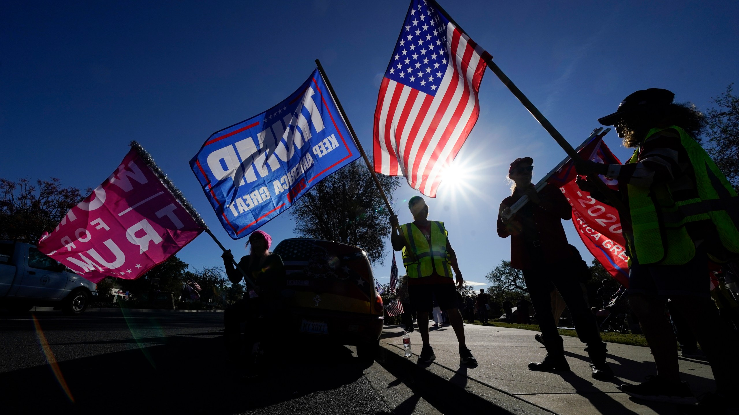 In this Jan. 6, 2021 file photo, people attend a rally in support of President Donald Trump outside Thousand Oaks City Hall in Thousand Oaks, Calif. (AP Photo/Ashley Landis, File)