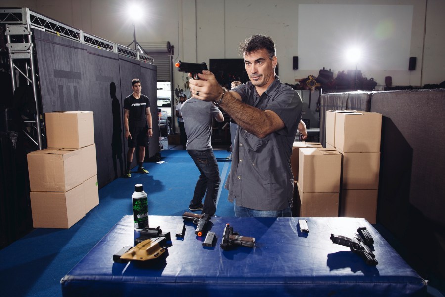 In this Oct. 7, 2014 photo, Chad Stahelski, co-director of the film, "John Wick," demonstrates proper gun handling during a training session at 87Eleven Action Design in Inglewood, Calif. (Photo by Casey Curry/Invision/AP, File)