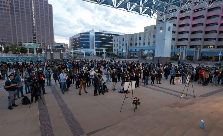 A large crowd of movie industry workers and New Mexico residents attend a candlelight vigil to honor cinematographer Halyna Hutchins in downtown Albuquerque, N.M. Saturday, Oct. 23, 2021. (AP Photo/Andres Leighton, file)