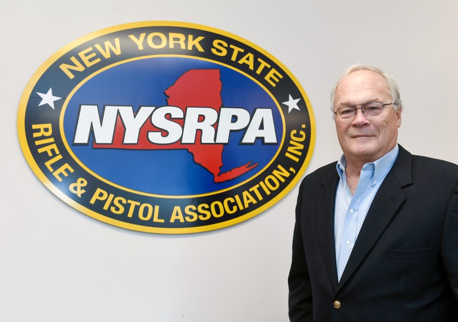 New York State Rifle & Pistol Association president Tom King poses for a photo Thursday, Oct. 28, 2021, in East Greenbush, N.Y. The Supreme Court is about to hear a gun rights case that could lead to more guns on the streets of New York and Los Angeles and threaten bans on guns in subways, airports, bars, churches, schools and other places where people gather. (AP Photo/Hans Pennink)