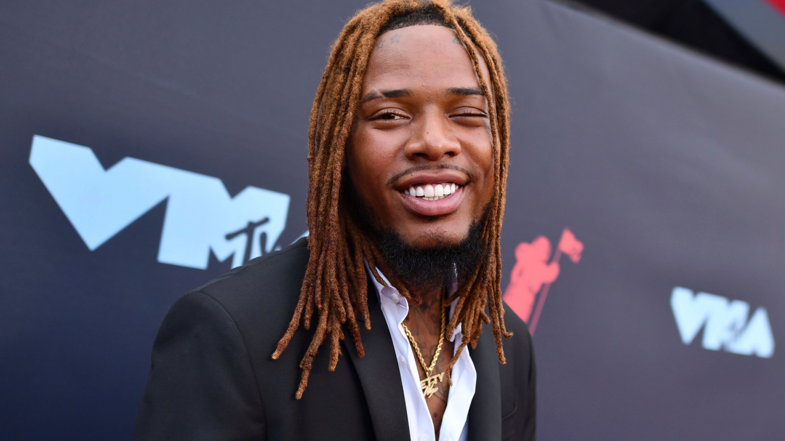 In this Aug. 26, 2019 file photo Fetty Wap arrives at the MTV Video Music Awards at the Prudential Center on in Newark, N.J. The rapper has been arrested in New York on federal drug charges, an FBI spokesperson said Friday, Oct. 29, 2021. (Photo by Charles Sykes/Invision/AP,File)