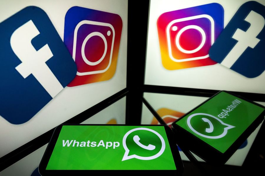 This picture, taken on Oct. 5, 2020, shows logos of social networks Facebook, Instagram and Whatsapp. (LIONEL BONAVENTURE/AFP via Getty Images)