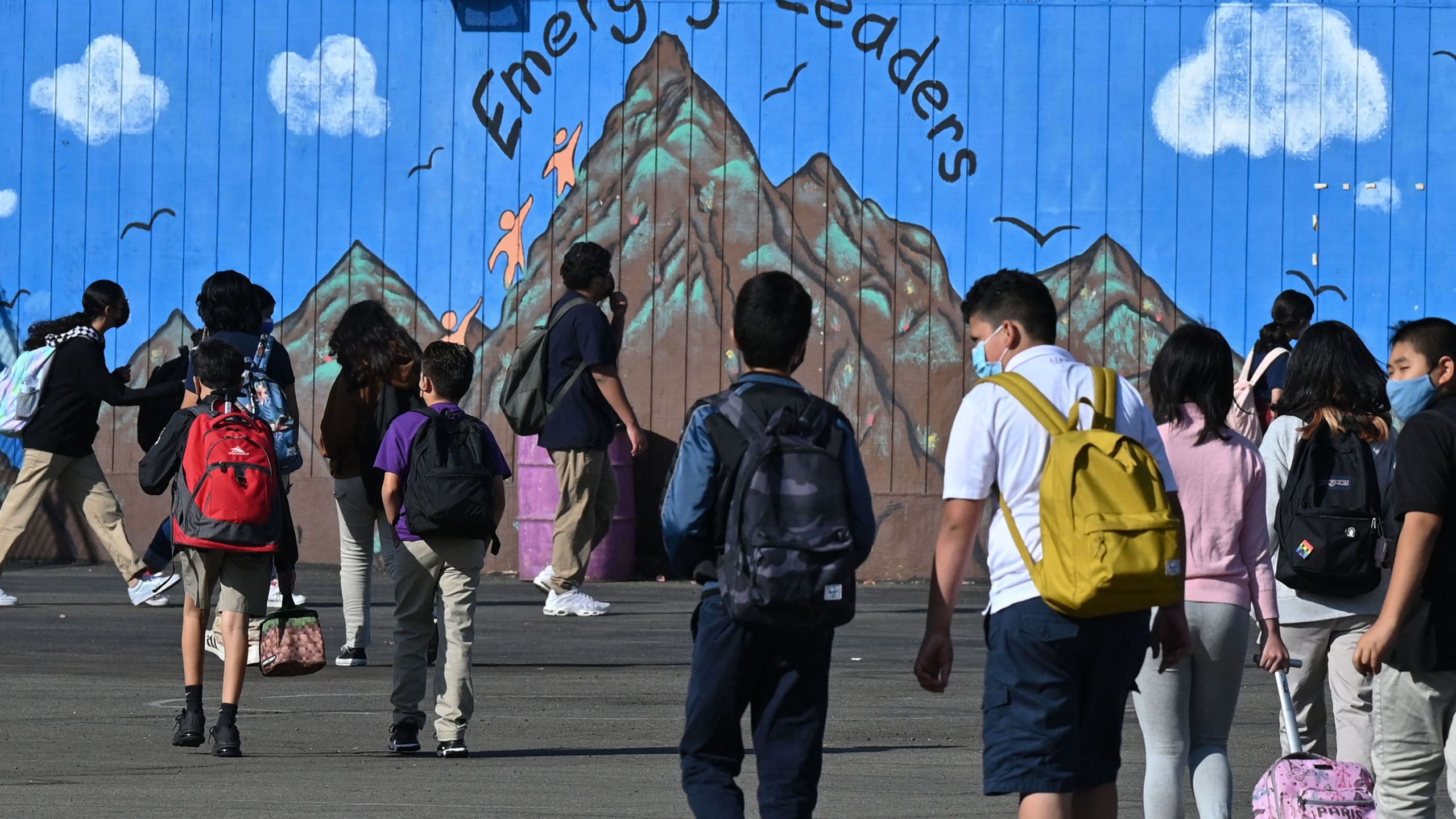 Students walk to their classrooms at a public middle school in Los Angeles on Sept. 10, 2021. (ROBYN BECK/AFP via Getty Images)