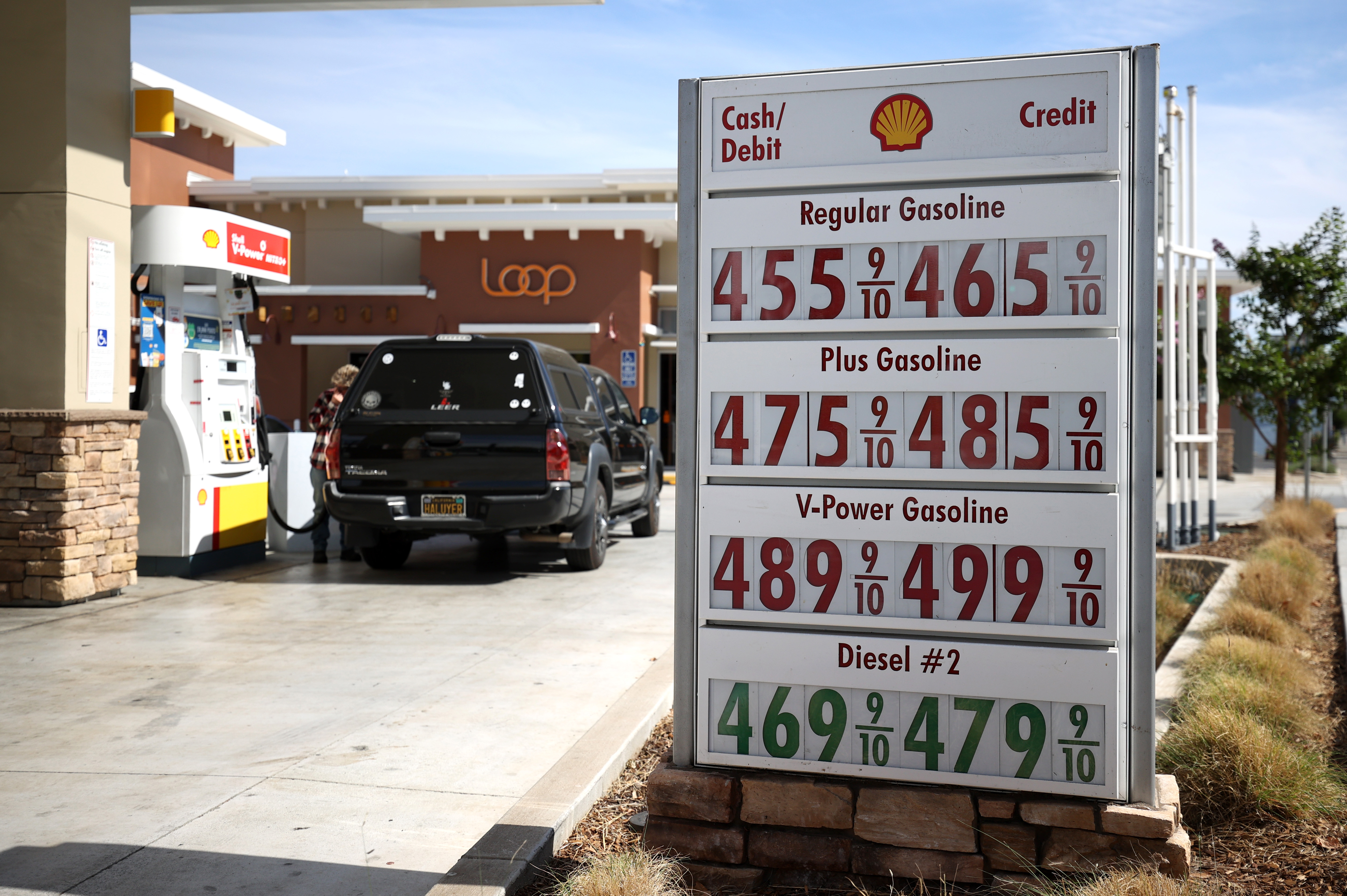 Gas prices approaching $5 a gallon are displayed in front of a Shell gas station on Oct. 5, 2021, in San Rafael. (Justin Sullivan/Getty Images)