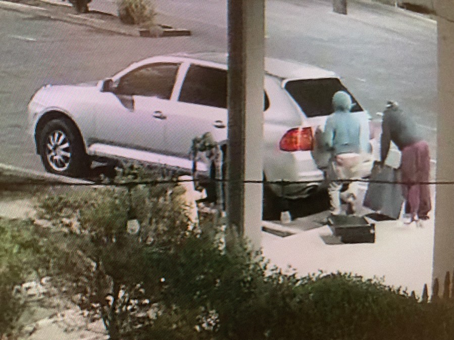 Three people driving a gray Porsche SUV burglarized four businesses on Oct. 5, 2021, according to the Santa Barbara County Sheriff's Office. (SBCSO)