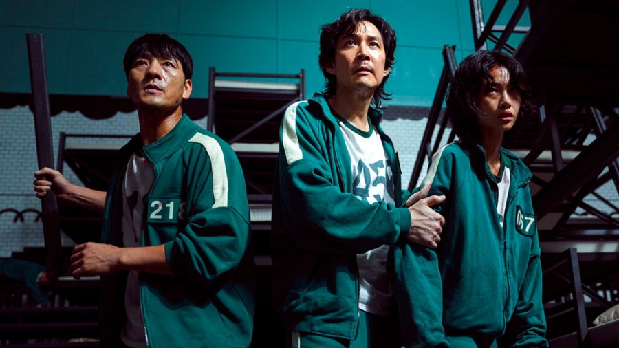 This undated photo released by Netflix shows South Korean cast members, from left, Park Hae-soo, Lee Jung-jae and Jung Ho-yeon in a scene from "Squid Game." (Youngkyu Park/Netflix via AP)