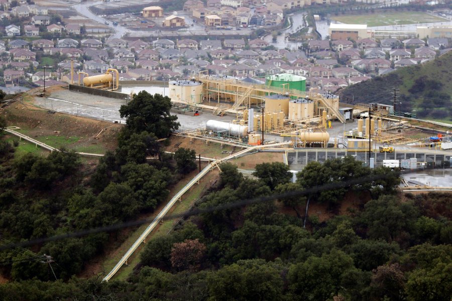 This Jan. 12, 2017, file photo, shows a gas gathering plant on a hilltop at the Southern California Gas Company's Aliso Canyon storage facility near the Porter Ranch neighborhood of Los Angeles. (AP Photo/Jae C. Hong, File)