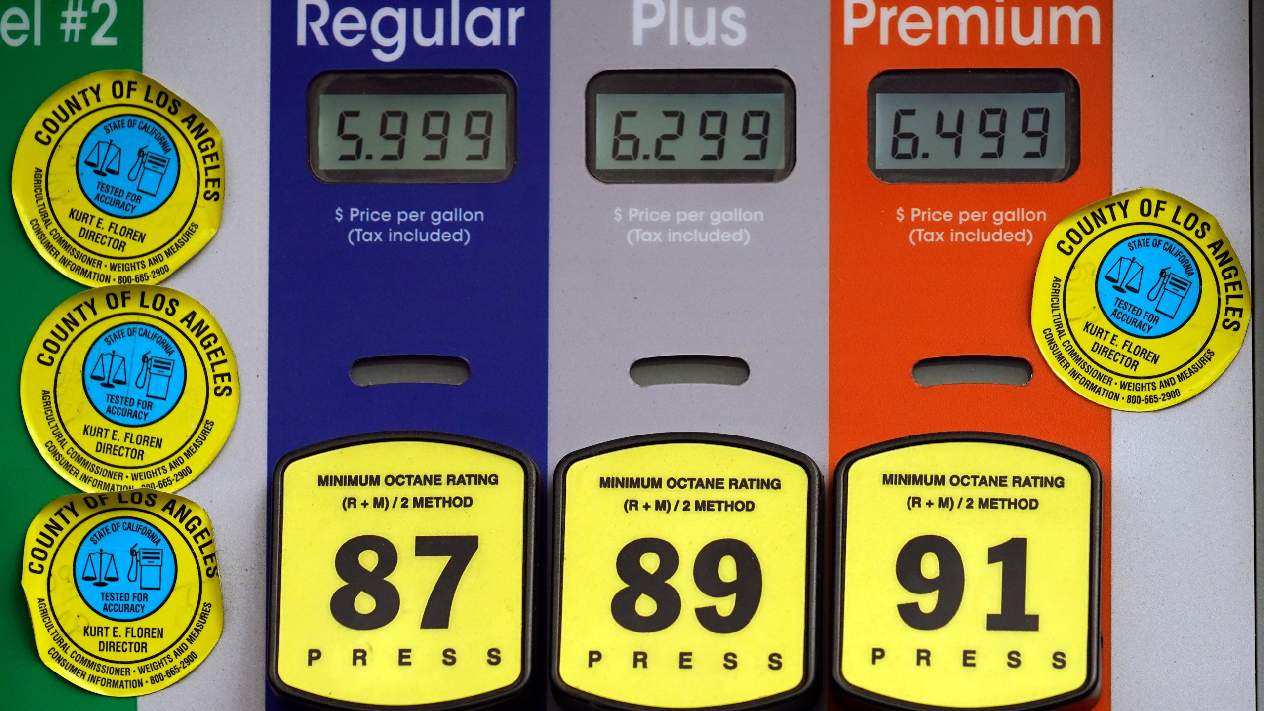 High gas prices are posted at a full service gas station in Beverly Hills, Calif., Sunday, Nov. 7, 2021. (AP Photo/Damian Dovarganes)